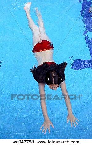 Girl in swimming pool View Large Photo Image Stock Photo - Girl in swimming pool. Fotosearch