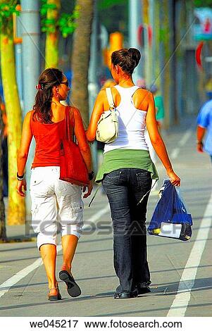 Girls walking. Barcelona. Spain. View Large Photo Image Stock Photo - Girls walking. Barcelona. Spain.. Fotosearch
