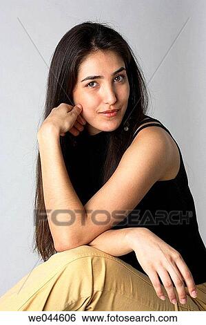 Hispanic/latin woman looking into the camera View Large Photo Image Stock Photograph - Hispanic/latin woman looking into the camera. Fotosearch