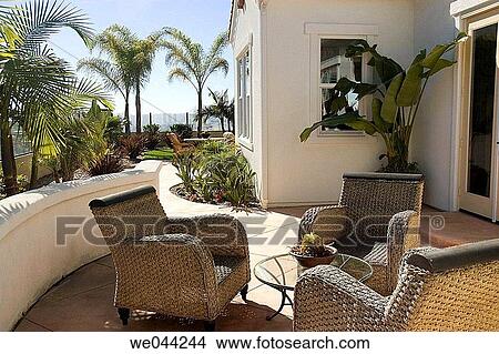 Home exterior with patio furniture, California, USA View Large Photo Image Picture - Home exterior with patio furniture, California, USA. Fotosearch
