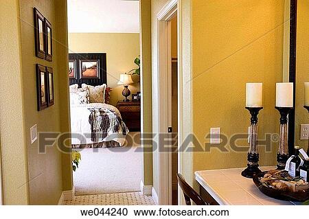 Stock Image - Home interior bedroom from bathroom. Fotosearch
