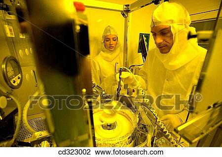 Stock Image - Inasmet-Tecnalia Foundation, Technology and Research Centre, San Sebastian Technological Park, Basque Country. Silicon wafer, Spinner, integrated circuits manufacture, photolithography room, clean room. Fotosearch
