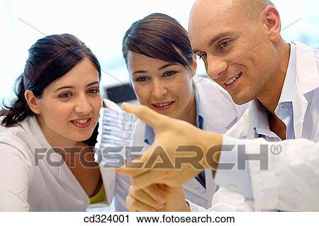 Stock Image - Inasmet-Tecnalia Foundation, Technology and Research Centre, San Sebastian Technological Park, Basque Country. Chemists with Petri dishes, microbiology lab. Fotosearch