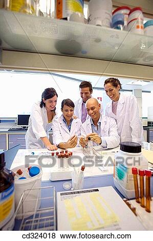 Stock Photo - Inasmet-Tecnalia Foundation, Technology and Research Centre, San Sebastian Technological Park, Basque Country. Chemists with Petri dishes, microbiology lab. Fotosearch