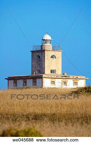 Lighthouse. Tabarca island, Alicante province, Comunidad Valenciana, Spain View Large Photo Image Stock Photo - Lighthouse. Tabarca island, Alicante province, Comunidad Valenciana, Spain. Fotosearch