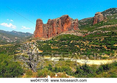 Mallos de Riglos rock formations. Huesca province, Arag? n, Spain View Large Photo Image Stock Photograph - Mallos de Riglos rock formations. Huesca province, Arag? n, Spain. Fotosearch