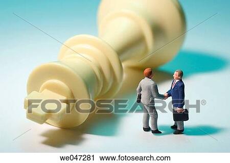 Miniature Businessman and Chess View Large Photo Image Stock Image - Miniature Businessman and Chess. Fotosearch