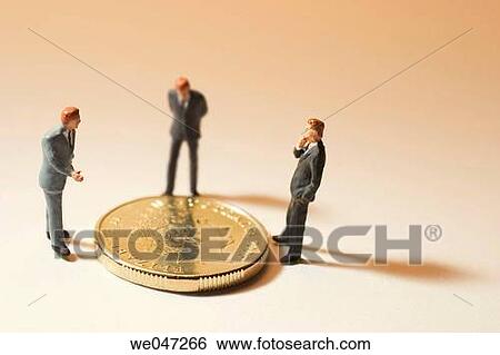 Miniature Businessmen and Coin View Large Photo Image Stock Photograph - Miniature Businessmen and Coin. Fotosearch