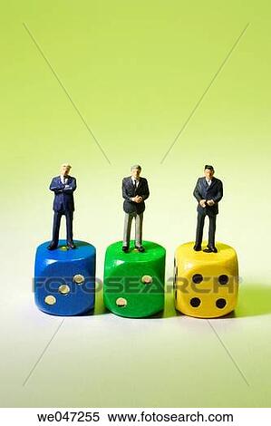 Miniature Businessmen on Dice View Large Photo Image Stock Photography - Miniature Businessmen on Dice. Fotosearch