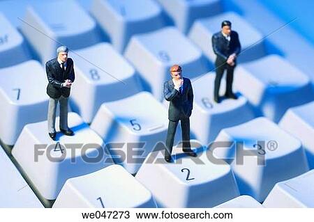 Miniature Businessmen on Keyboard View Large Photo Image Stock Image - Miniature Businessmen on Keyboard. Fotosearch
