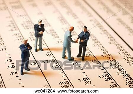 Miniature Businessmen on Stock Page View Large Photo Image Picture - Miniature Businessmen on Stock Page. Fotosearch