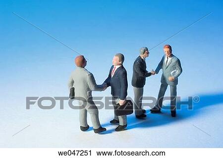 Miniature Businessmen Shaking Hands View Large Photo Image Stock Image - Miniature Businessmen Shaking Hands. Fotosearch