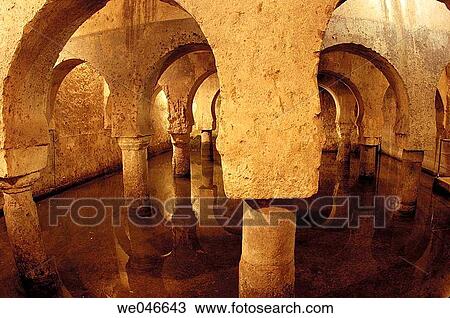 Stock Image - Moorish? aljibe? (water cistern) in the cellar of the Palacio de las Veletas, Cßceres. Extremadura, Spain. Fotosearch