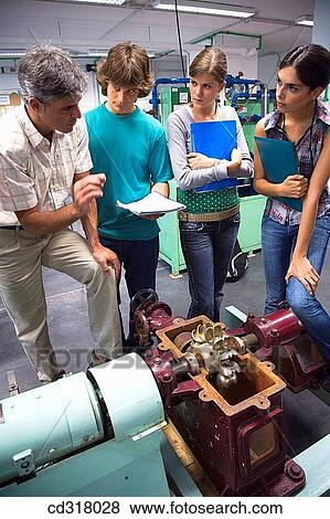 Polytechnic School, University of the Basque Country, Donostia, Gipuzkoa, Basque Country. Students, Turbine, Hydraulic machines laboratory, Department of Nuclear Engineering and Fluid Mechanics View Large Photo Image Stock Photo - Polytechnic School, University of the Basque Country, Donostia, Gipuzkoa, Basque Country. Students, Turbine, Hydraulic machines laboratory, Department of Nuclear Engineering and Fluid Mechanics. Fotosearch