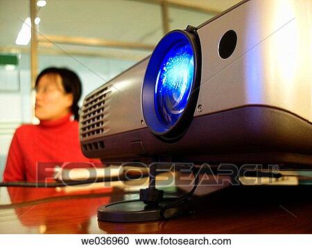 Screen projector during a business meeting asian female in the background. View Large Photo Image Stock Image - Screen projector during a business meeting asian female in the background.. Fotosearch