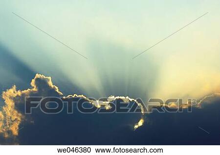 Singapore, sun beams from behind big cumulus cloud View Large Photo Image Stock Image - Singapore, sun beams from behind big cumulus cloud. Fotosearch