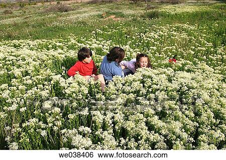 Spring. Children playing in the countryside. View Large Photo Image Stock Photograph - Spring. Children playing in the countryside.. Fotosearch