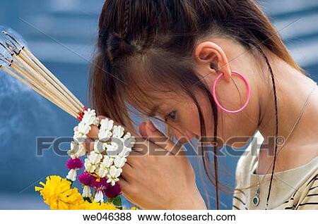 Thailand, Bangkok, Thai girl? Jane? praying with joss sticks at Erawan Shrine,, MR_0604-0004_Jan View Large Photo Image Stock Photo - Thailand, Bangkok, Thai girl? Jane? praying with joss sticks at Erawan Shrine,, MR_0604-0004_Jan. Fotosearch