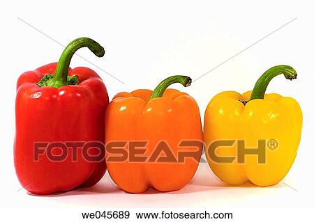 Three peppers; on red pepper; one orange pepper; one yellow pepper; stems moving in same direction View Large Photo Image Stock Photo - Three peppers; on red pepper; one orange pepper; one yellow pepper; stems moving in same direction. Fotosearch
