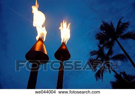 Tiki torches at night, Oahu. Hawaii. USA. View Large Photo Image Picture - Tiki torches at night, Oahu. Hawaii. USA.. Fotosearch