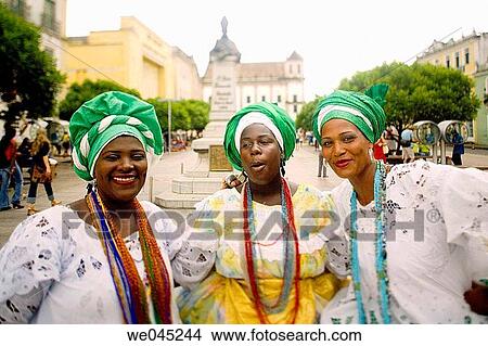Traditional Bahian Dress, Praca de Se, Pelourinho area of Salvador da Bahia, considered by UNESCO to be the most important grouping of 17th & 18th Century Colonial Architecture in the Americas, Brazil View Large Photo Image Picture - Traditional Bahian Dress, Praca de Se, Pelourinho area of Salvador da Bahia, considered by UNESCO to be the most important grouping of 17th & 18th Century Colonial Architecture in the Americas, Brazil. Fotosearch