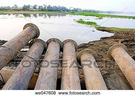 Water pipes for irrigation under construction. River Nile between Qena and Luxor. Upper Egypt View Large Photo Image Stock Photo - Water pipes for irrigation under construction. River Nile between Qena and Luxor. Upper Egypt. Fotosearch