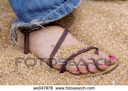 Woman feet on sand. View Large Photo Image Stock Photo - Woman feet on sand.. Fotosearch