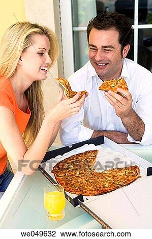 Stock Image - 30's, at-home, 20's. Fotosearch