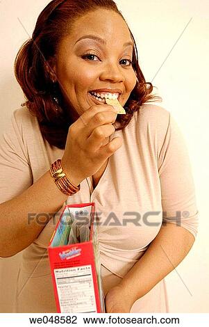 30's, biting, bite, African-American, 20 View Large Photo Image Stock Image - 30's, biting, bite, African-American, 20. Fotosearch