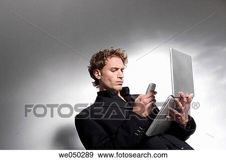 Stock Photo - 30's, businesspeople, businessman, balance, 20's. Fotosearch
