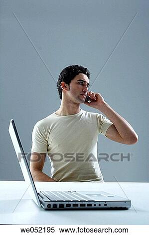 Stock Photography - 30's, calling, business, 20's. Fotosearch