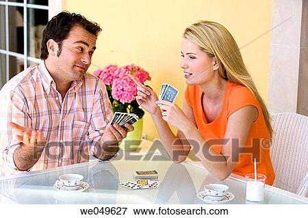 Stock Photo - 30's, card, at-home, 20's. Fotosearch