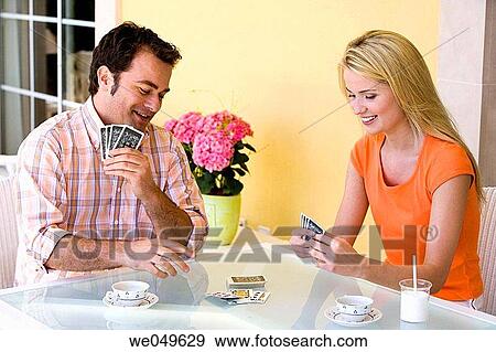 Stock Photo - 30's, card, at-home, amusement, 20's. Fotosearch