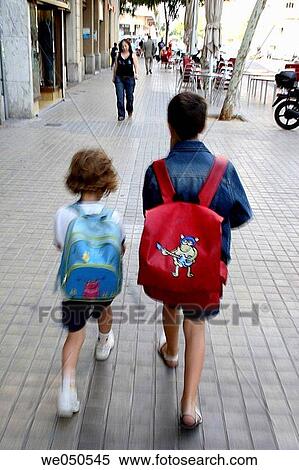 9 and 5 year old boy and girl going to school View Large Photo Image Stock Photography - 9 and 5 year old boy and girl going to school. Fotosearch