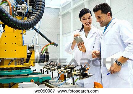 a, Gipuzkoa, Basque Country. Advanced industrial robotic system, final assembly of the motor drive. View Large Photo Image Stock Photo - a, Gipuzkoa, Basque Country. Advanced industrial robotic system, final assembly of the motor drive.. Fotosearch