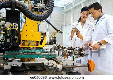 a, Gipuzkoa, Basque Country. Advanced industrial robotic system, final assembly of the motor drive. View Large Photo Image Stock Photograph - a, Gipuzkoa, Basque Country. Advanced industrial robotic system, final assembly of the motor drive.. Fotosearch