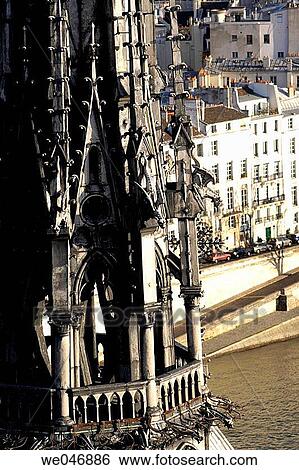 Stock Photograph - Aerial view of the bell tower of the Notre Dame Catehdral with the Seine River banks below. Paris. France. Fotosearch