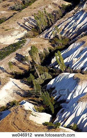 Aerial view of volcanic formations and trees. Cappadocia. Turkey. View Large Photo Image Stock Image - Aerial view of volcanic formations and trees. Cappadocia. Turkey.. Fotosearch