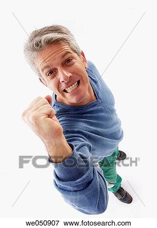 aggressiveness, Clenching fist, baby boomer, aggressive View Large Photo Image Stock Photo - aggressiveness, Clenching fist, baby boomer, aggressive. Fotosearch