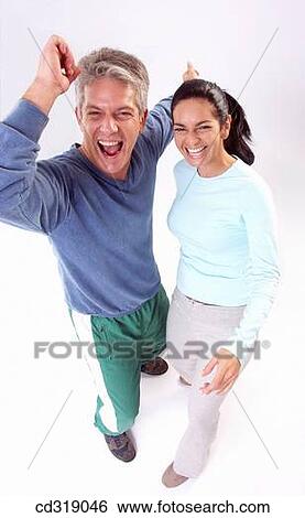 amusement, baby boomer, Arms raised, amusing, achievement View Large Photo Image Stock Photograph - amusement, baby boomer, Arms raised, amusing, achievement. Fotosearch