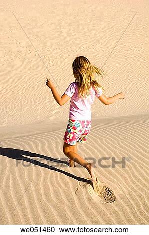 amusement, beach, barefoot, back view, activity View Large Photo Image Stock Image - amusement, beach, barefoot, back view, activity. Fotosearch
