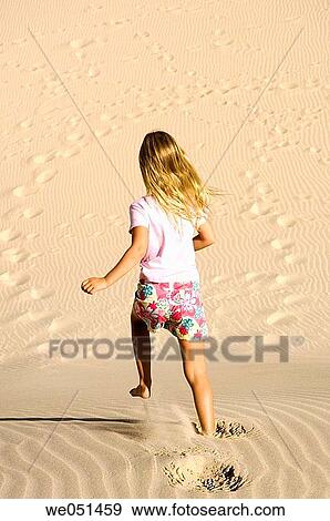 amusement, beach, barefoot, back view, activity View Large Photo Image Stock Photo - amusement, beach, barefoot, back view, activity. Fotosearch