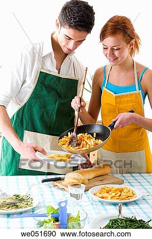 amusement, Best friend, at-home, apron, 20's View Large Photo Image Stock Image - amusement, Best friend, at-home, apron, 20's. Fotosearch