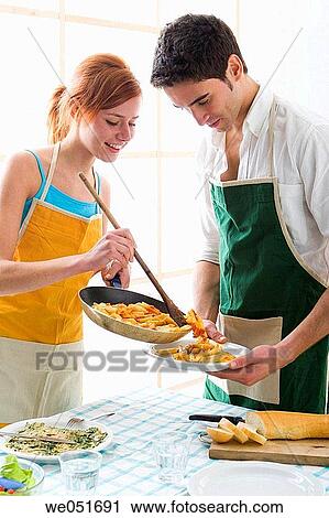 amusement, Best friend, at-home, apron, 20's View Large Photo Image Stock Image - amusement, Best friend, at-home, apron, 20's. Fotosearch