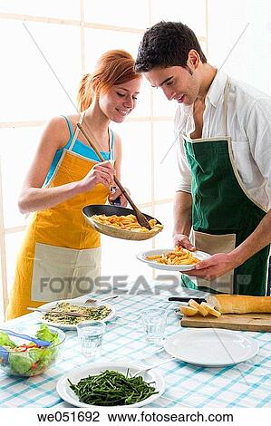 amusement, Best friend, at-home, apron, 20's View Large Photo Image Stock Image - amusement, Best friend, at-home, apron, 20's. Fotosearch