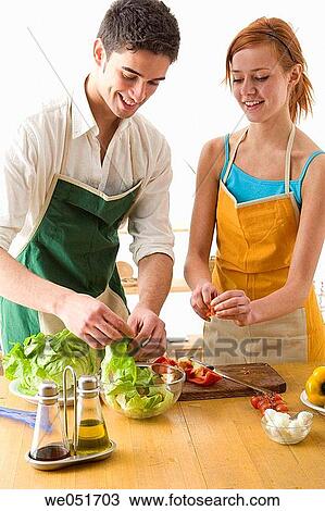 amusement, Best friend, at-home, apron, 20's View Large Photo Image Stock Image - amusement, Best friend, at-home, apron, 20's. Fotosearch