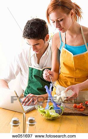 amusement, Best friend, at-home, apron, 20's View Large Photo Image Stock Photo - amusement, Best friend, at-home, apron, 20's. Fotosearch