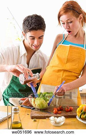 amusement, Best friend, at-home, apron, 20's View Large Photo Image Stock Photograph - amusement, Best friend, at-home, apron, 20's. Fotosearch