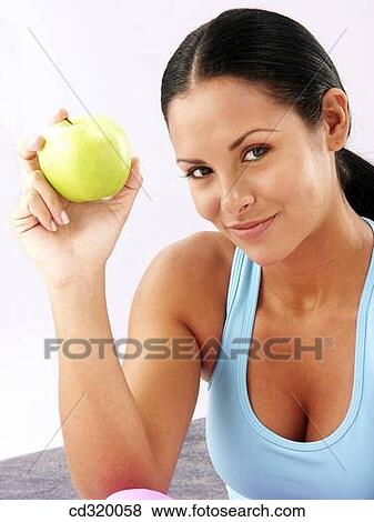 apple, contemporary, brunette, 20's View Large Photo Image Stock Photo - apple, contemporary, brunette, 20's. Fotosearch