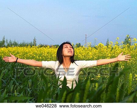 Asian, contemporary, brunette, Arms open View Large Photo Image Stock Photo - Asian, contemporary, brunette, Arms open. Fotosearch